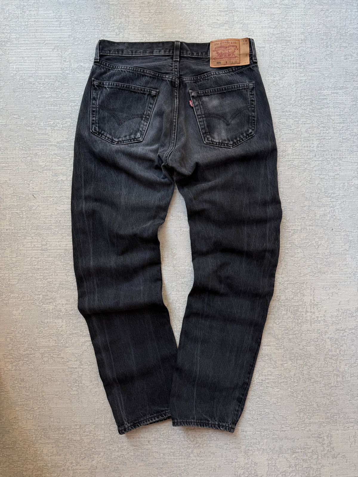 Levi’s 501 Black Fadded Jeans (W33 L32)