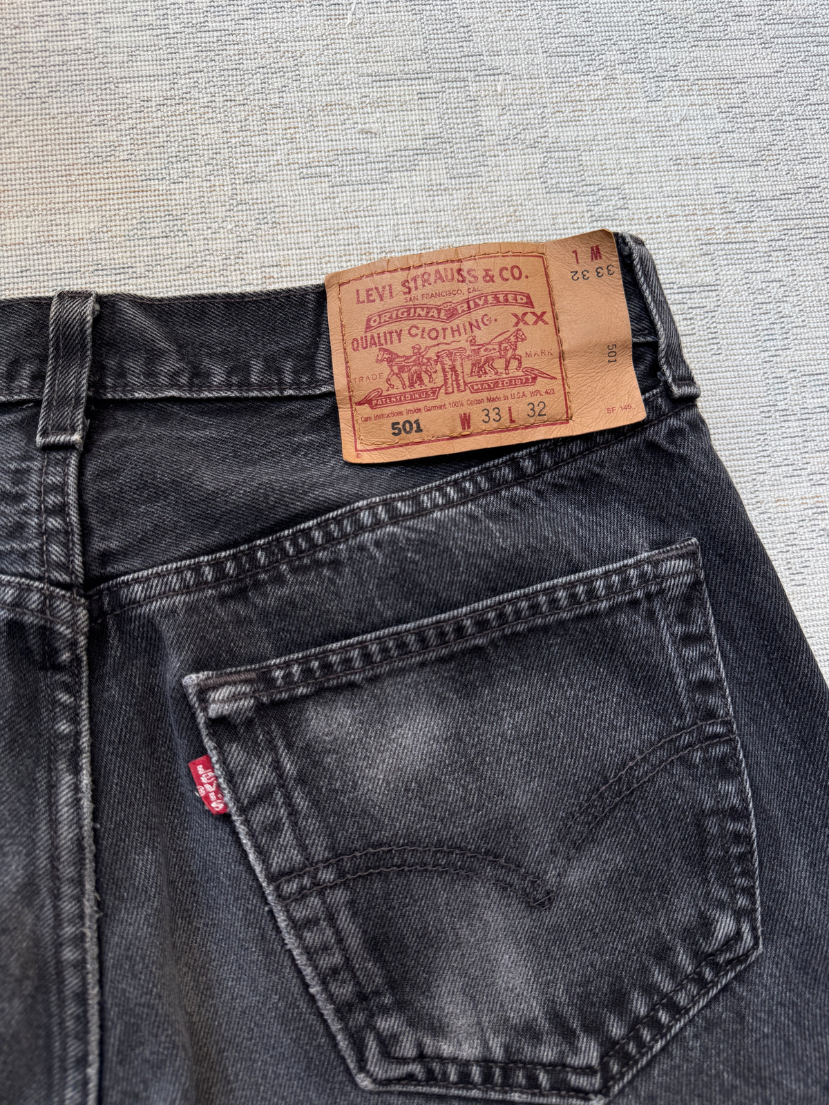 Levi’s 501 Black Fadded Jeans (W33 L32)