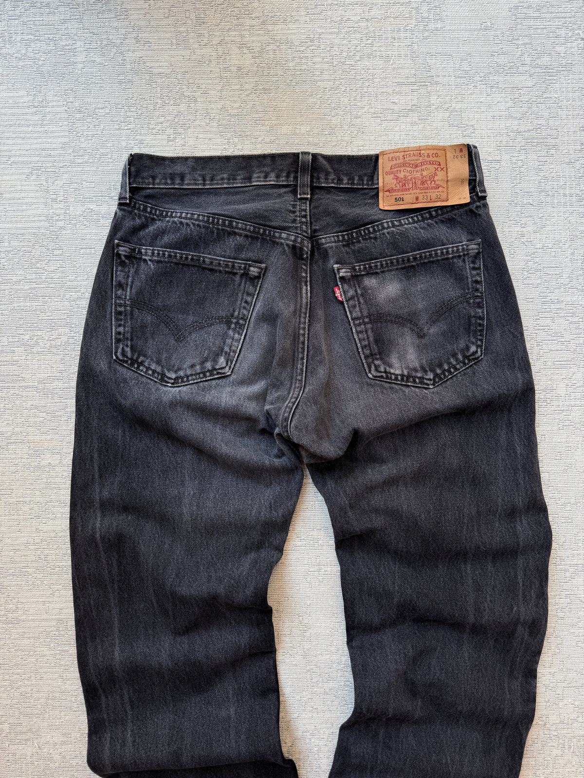 Levi’s 501 Black Fadded Jeans (W33 L32)