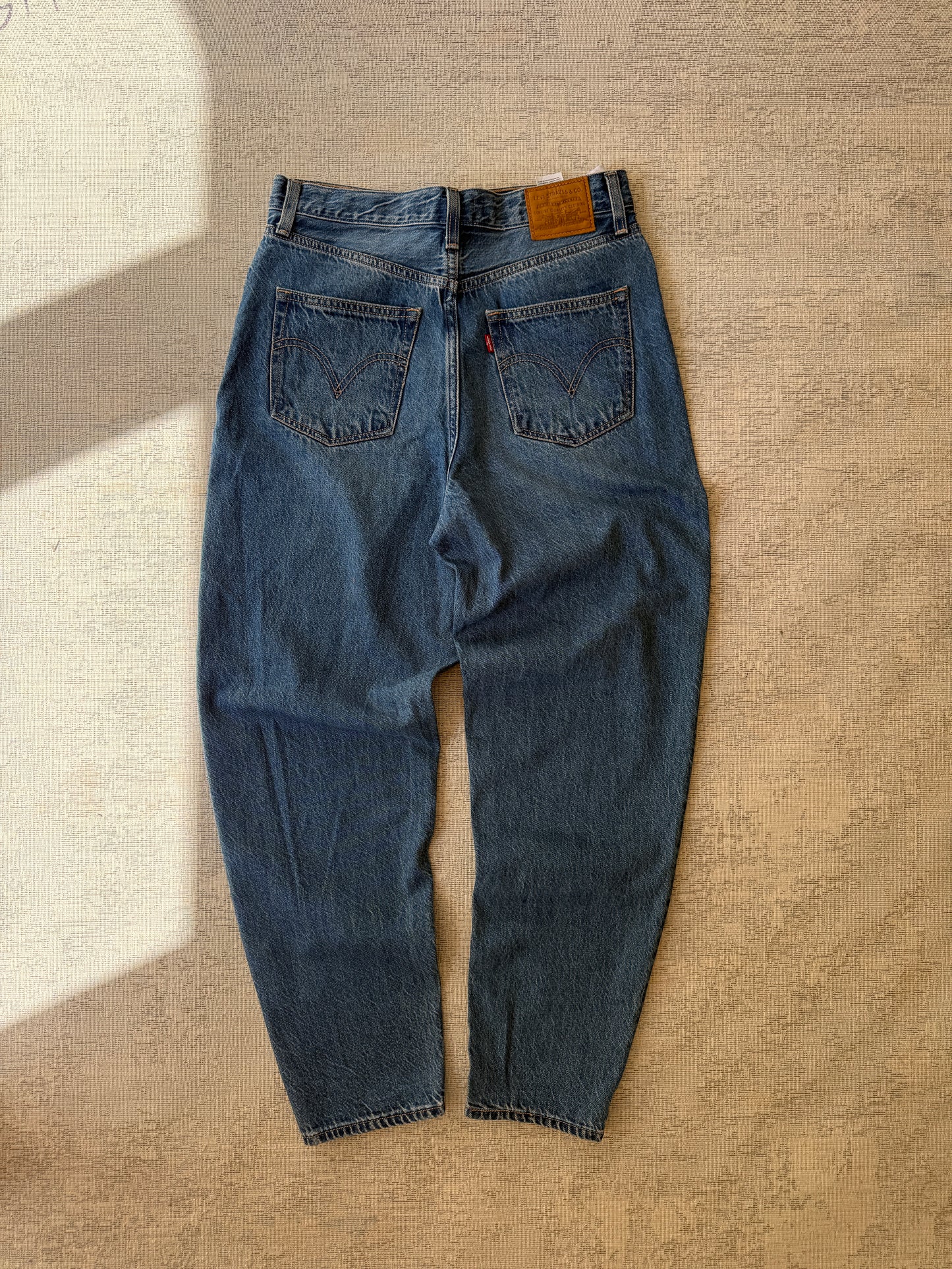 Levi’s High Loose Taper Jeans (Women’s W29)